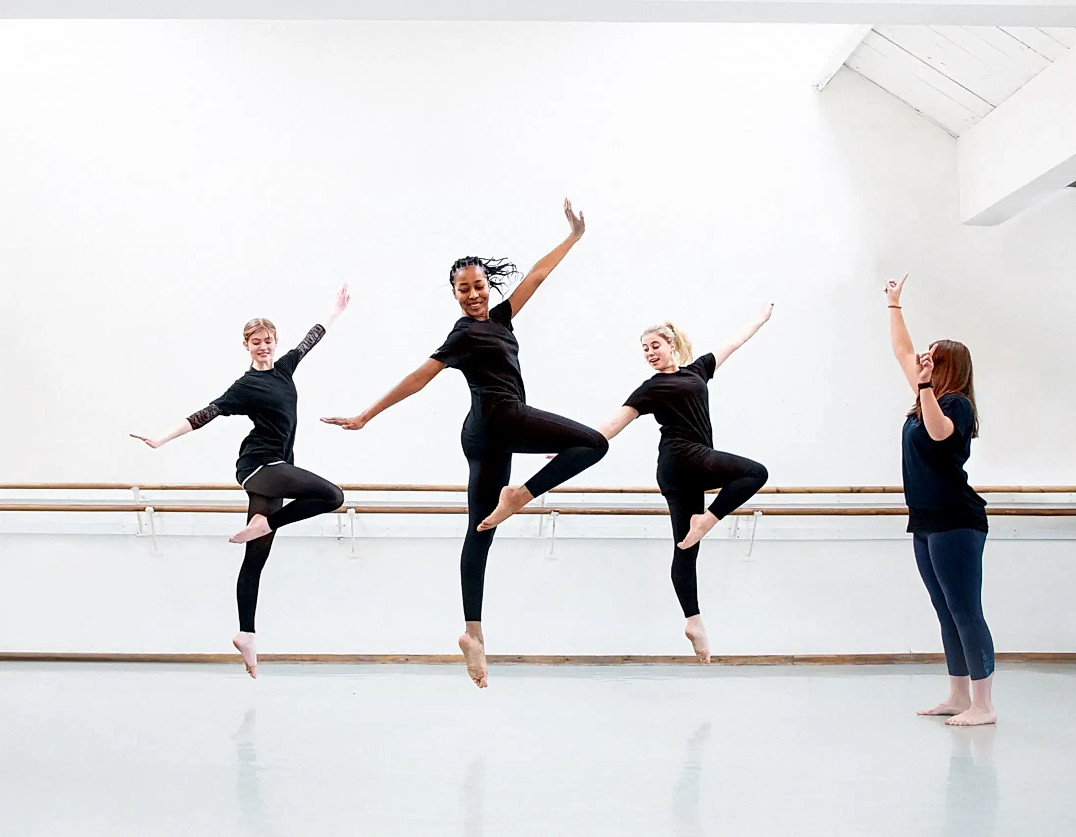 RAD-RTS-card-TCross | Royal Academy of Dance three students dancing in RAD headquarters studio